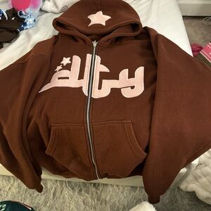 Brown Zip-Up Sweater with Pink Accents